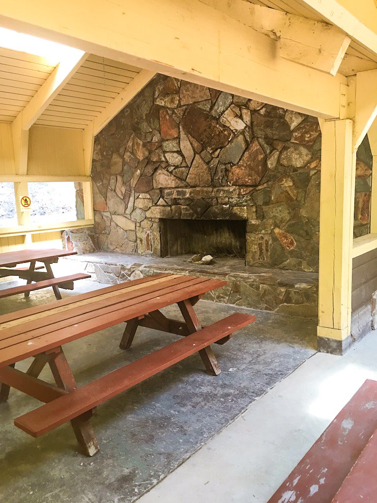 Covered picnic area at Meriwether Picnic Area next to Holter Lake in Montana.