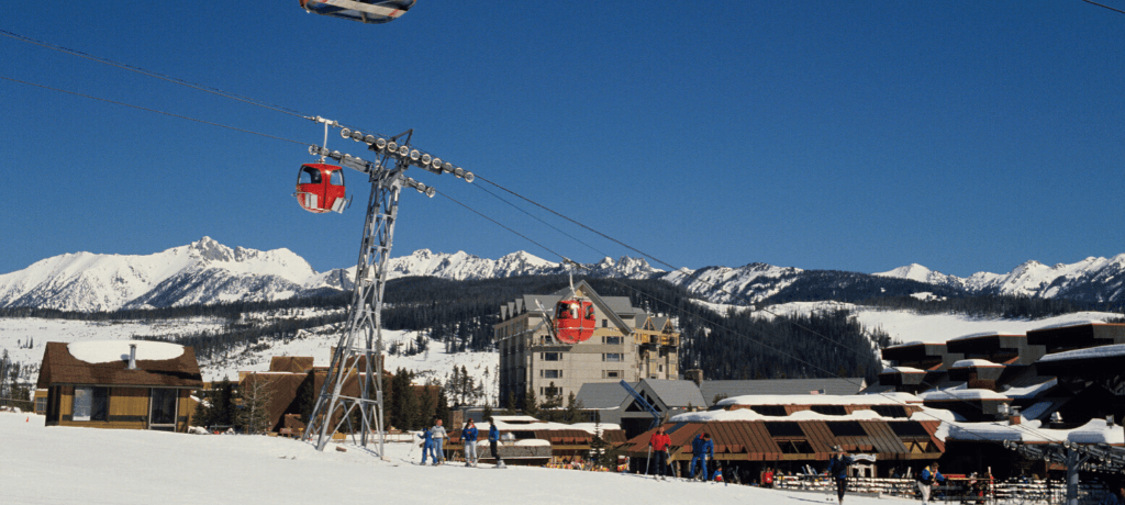 Gondolas and skiers in Big Sky, Montana